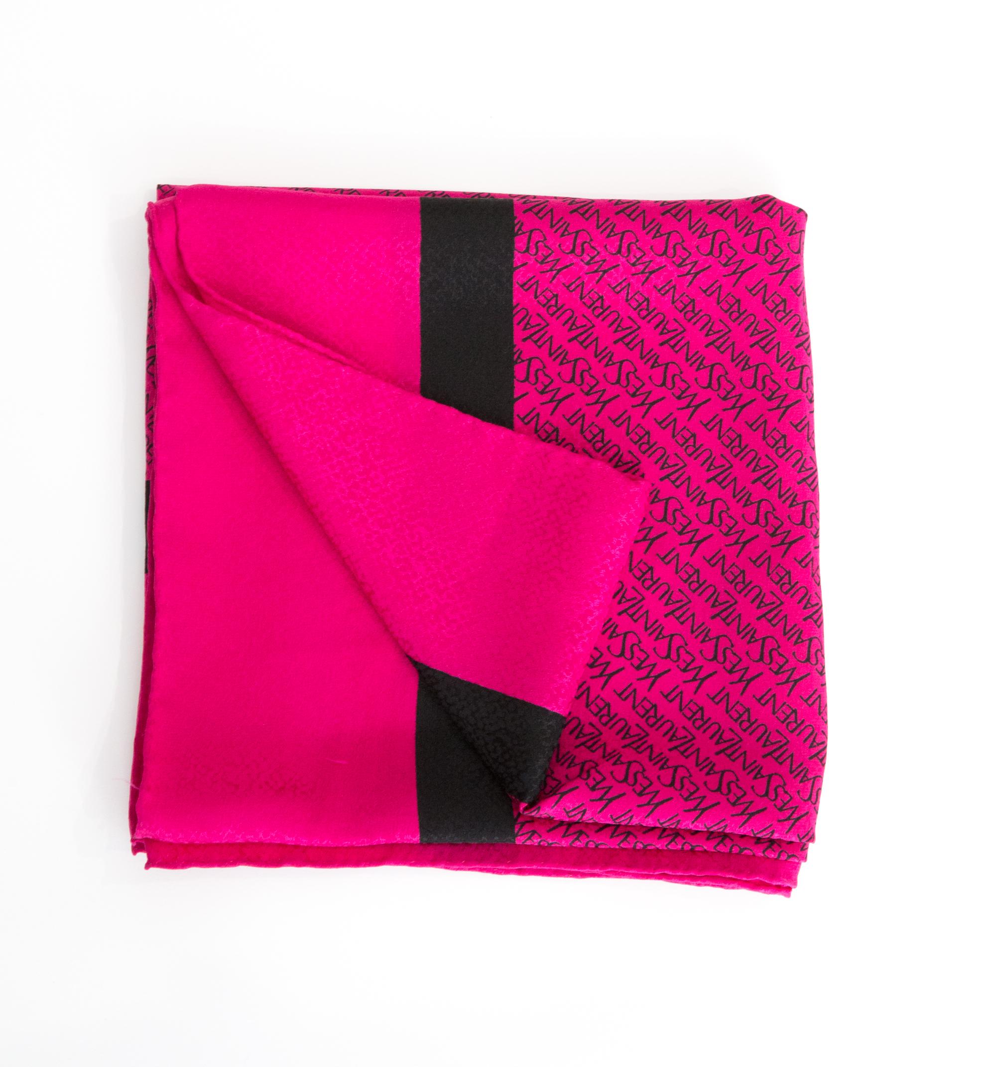 Yves Saint Laurent YSL pink silk scarf featuring a black logo all-over print, a jacquard ground and a top logo signature. 
Circa 1980s
In good vintage condition. Made in France.
33.5in. (85cm) X 33.5in. (85cm)
We guarantee you will receive this 
