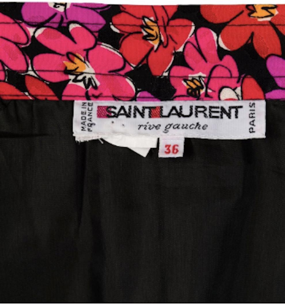 Yves Saint Laurent YSL printed silk wrap skirt featuring a jacquard silk printed, a pink & red flower pattern,  a hook to fix the wrap skirt, a full lining, straight hem. 
Circa 1980s 
Composition: 100% Silk
Label size 36fr/ US4/ UK8
In good vintage