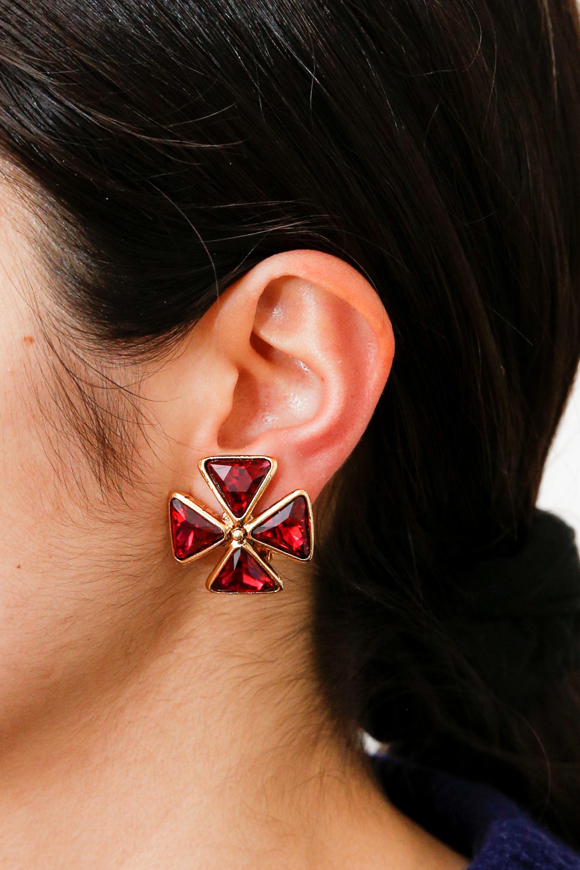 Saint Laurent YSL red crystal-embellished clip-on earrings featuring  a cross shape with crystal embellishment, clip-on design, a plaque pitted at back.  
Made in France, Circa 1990s. 
They come as a pair.
1in (2.5cm) X 1in (2.5cm)
In excellent