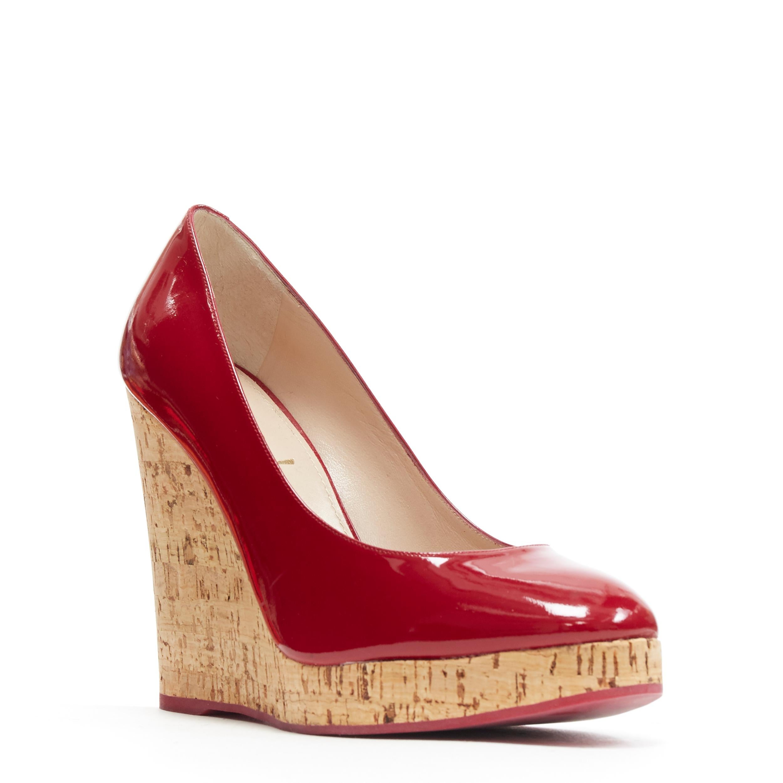 YVES SAINT LAURENT YSL red patent leather round toe cork wedge platform EU39
Brand: Yves Saint Laurent
Model Name / Style: Cork wedge
Material: Patent leather
Color: Red
Pattern: Solid
Extra Detail: Ultra High (4 in & Higher) heel height. Almond