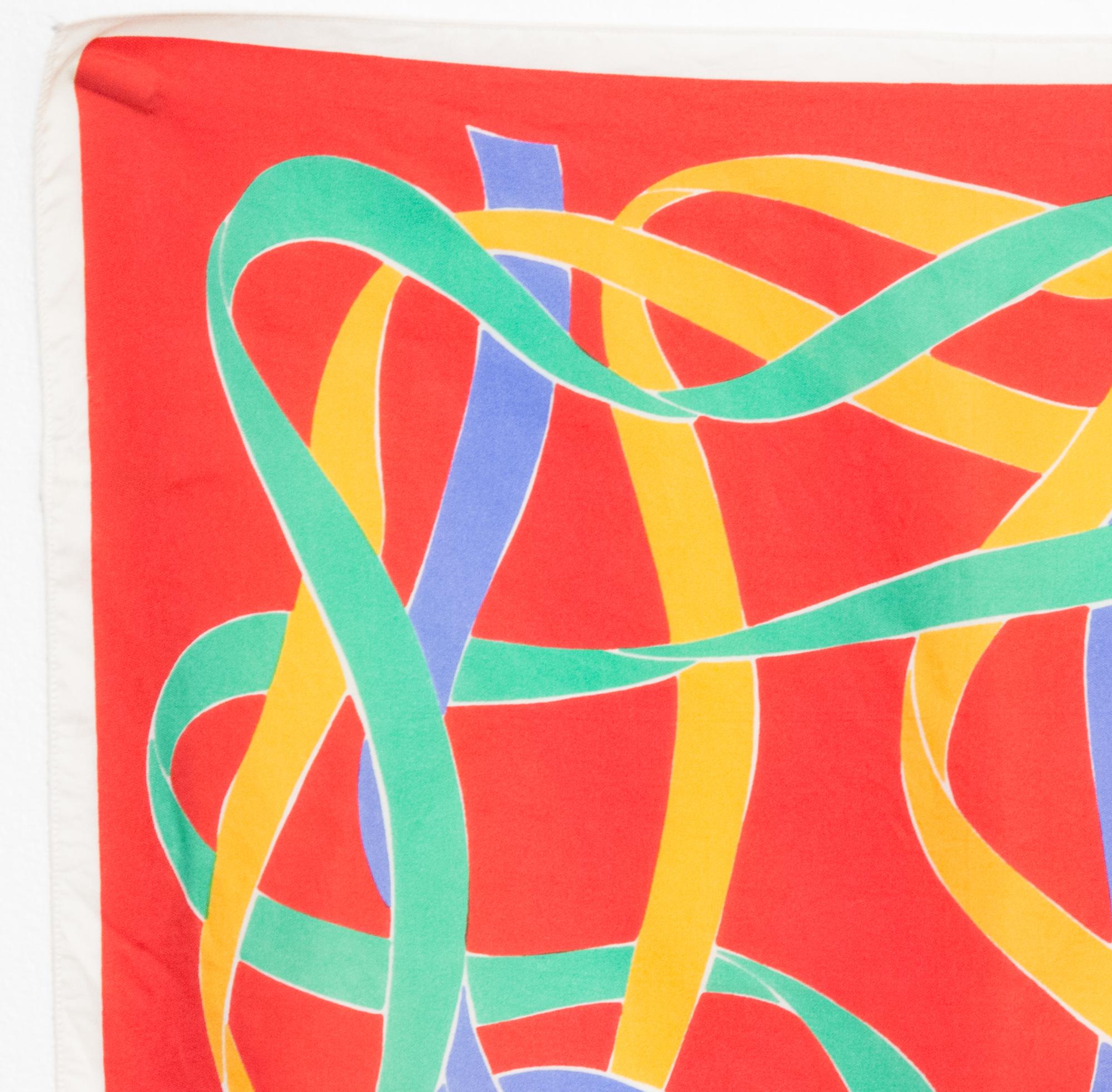 1990 Tokyo Yves Saint Laurent YSL small silk scarf featuring a multicolour ribbons scene, signature marked on.
In good vintage condition. Made in France.
14.9in. (38cm) X 14.9in. (38cm)
We guarantee you will receive this  iconic item as described
