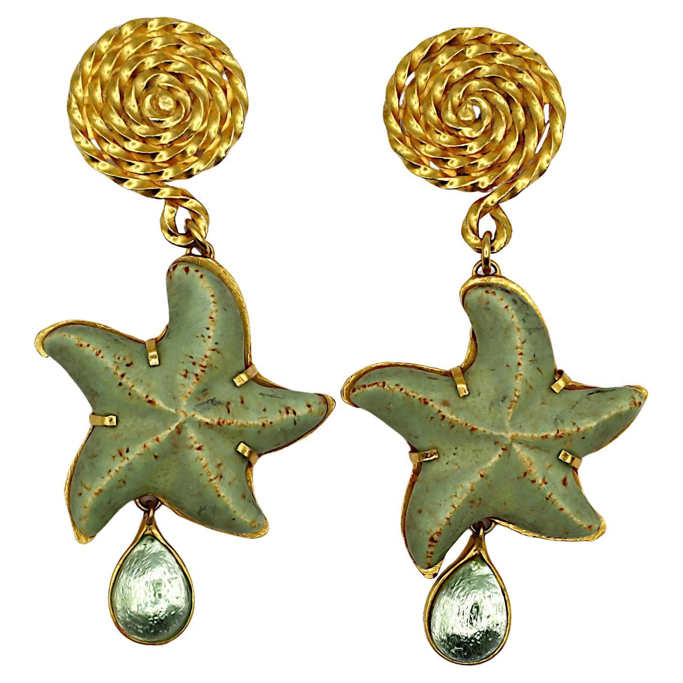 YVES SAINT LAURENT YSL Rive Gauche, boucles d'oreilles pendantes vintage en forme d'étoiles de mer en vente