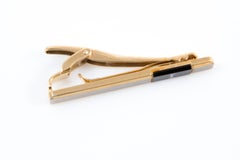 Yves Saint Laurent YSL Silberfarbener & Schwarzer Cassandre Krawatten-Link