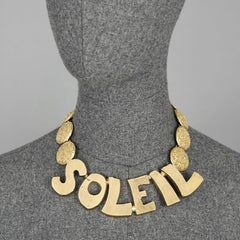 YVES SAINT LAURENT Ysl "Soleil"  Textured Disc Choker Necklace by Robert Goossen