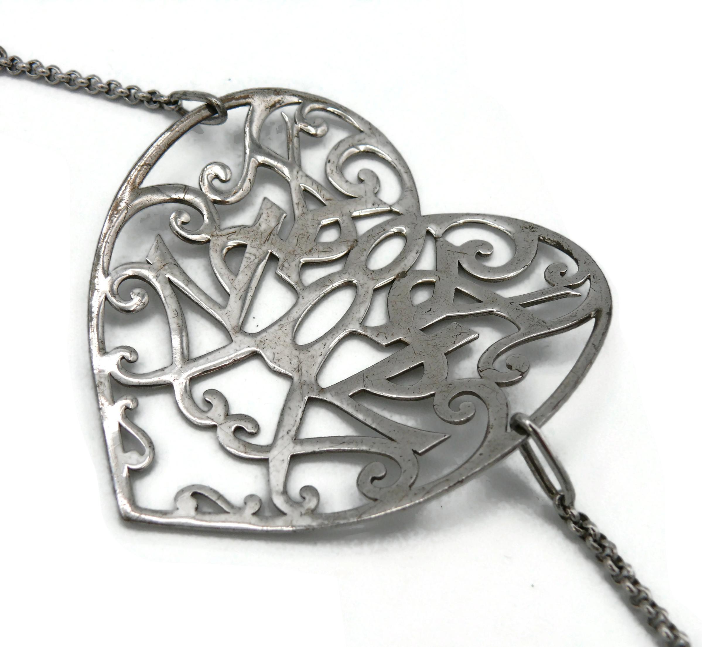 YVES SAINT LAURENT (Attbituted To) Pulsera corazón de plata de ley en venta 12