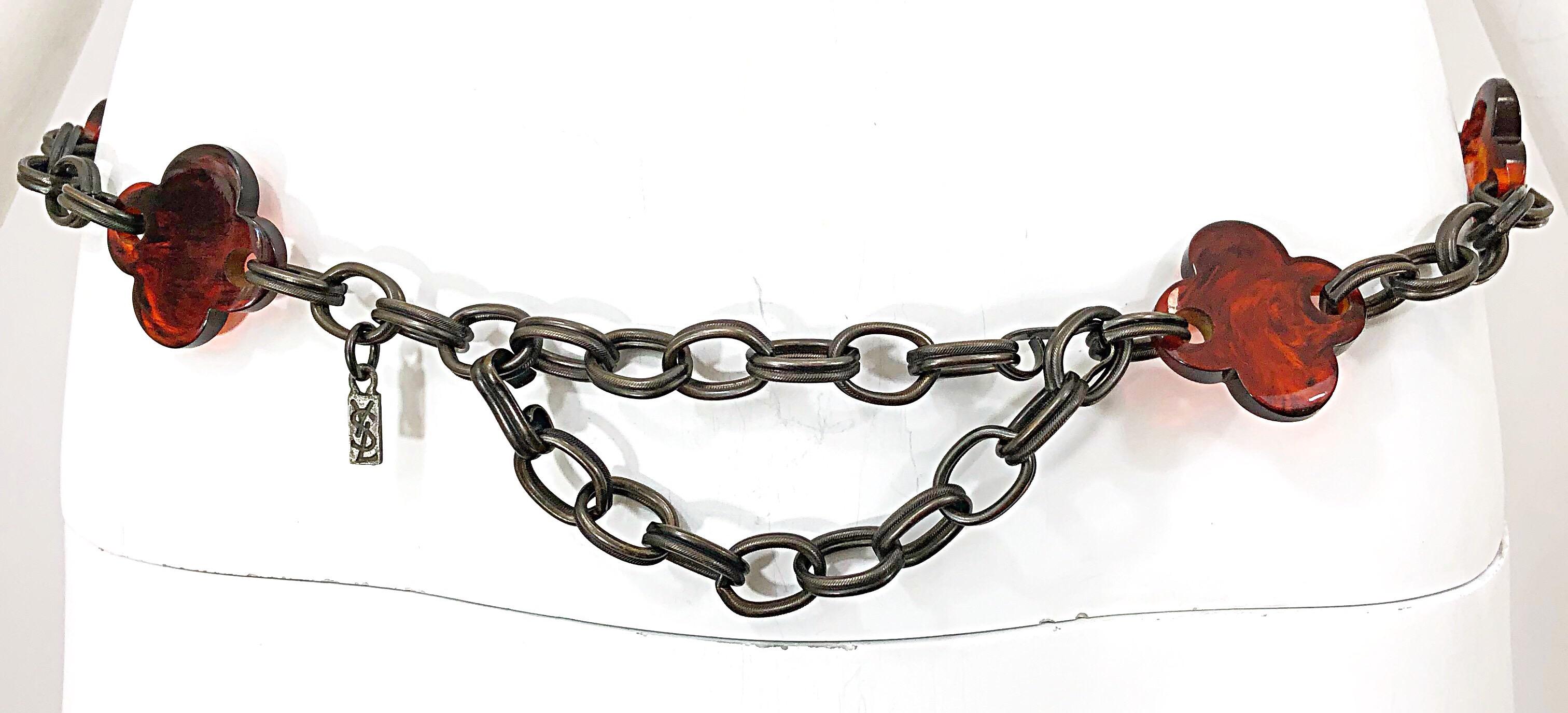 Rare vintage YVES SAINT LAURENT YSL four leaf clover tortoise and pewter chain link belt OR necklace! Features amber colored lucite clover shapes. YSL metal logo plate. Can really add some extra punch to any outfit. Great with jeans and a tank, or