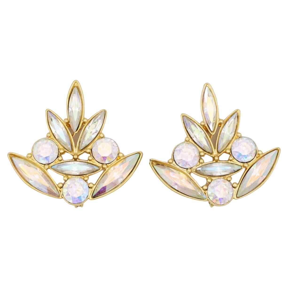 Yves Saint Laurent YSL Vintage Arty Aurora Borealis White Cluster Crystals Flower Leaf Clip Elegant Earrings, Gold Tone

Vintage and very rare to find. 100% Genuine. Signed at the rear.

Very excellent condition. Very new. 

Material: Gold plated