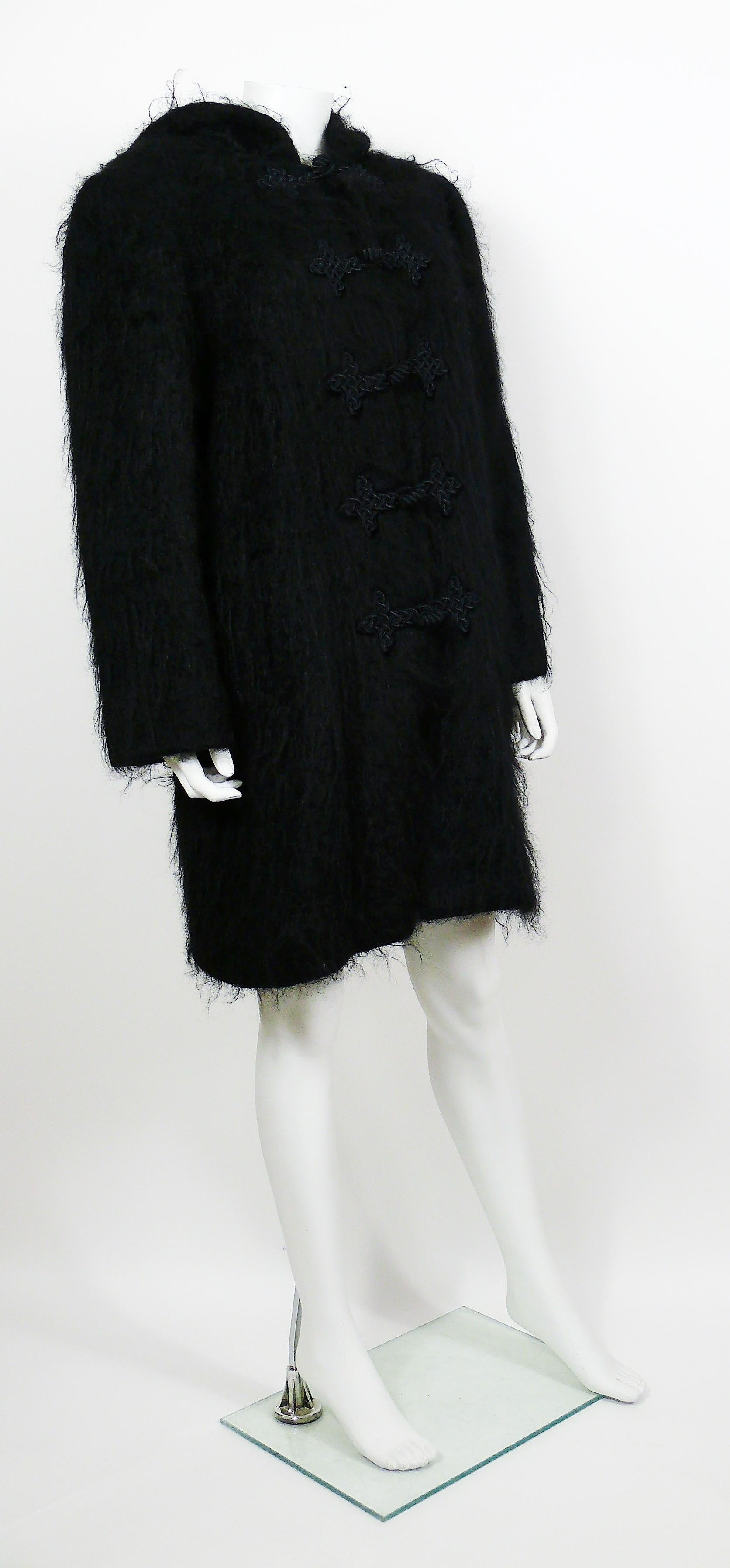 YVES SAINT LAURENT vintage black hooded mohair coast featuring Brandebourg front buttoning.

Two side pockets.
Shoulder pads.
Unllined.

Label reads YVES SAINT LAURENT RIVE GAUCHE Paris.
Made in France.

Missing size tag.
Please refer to