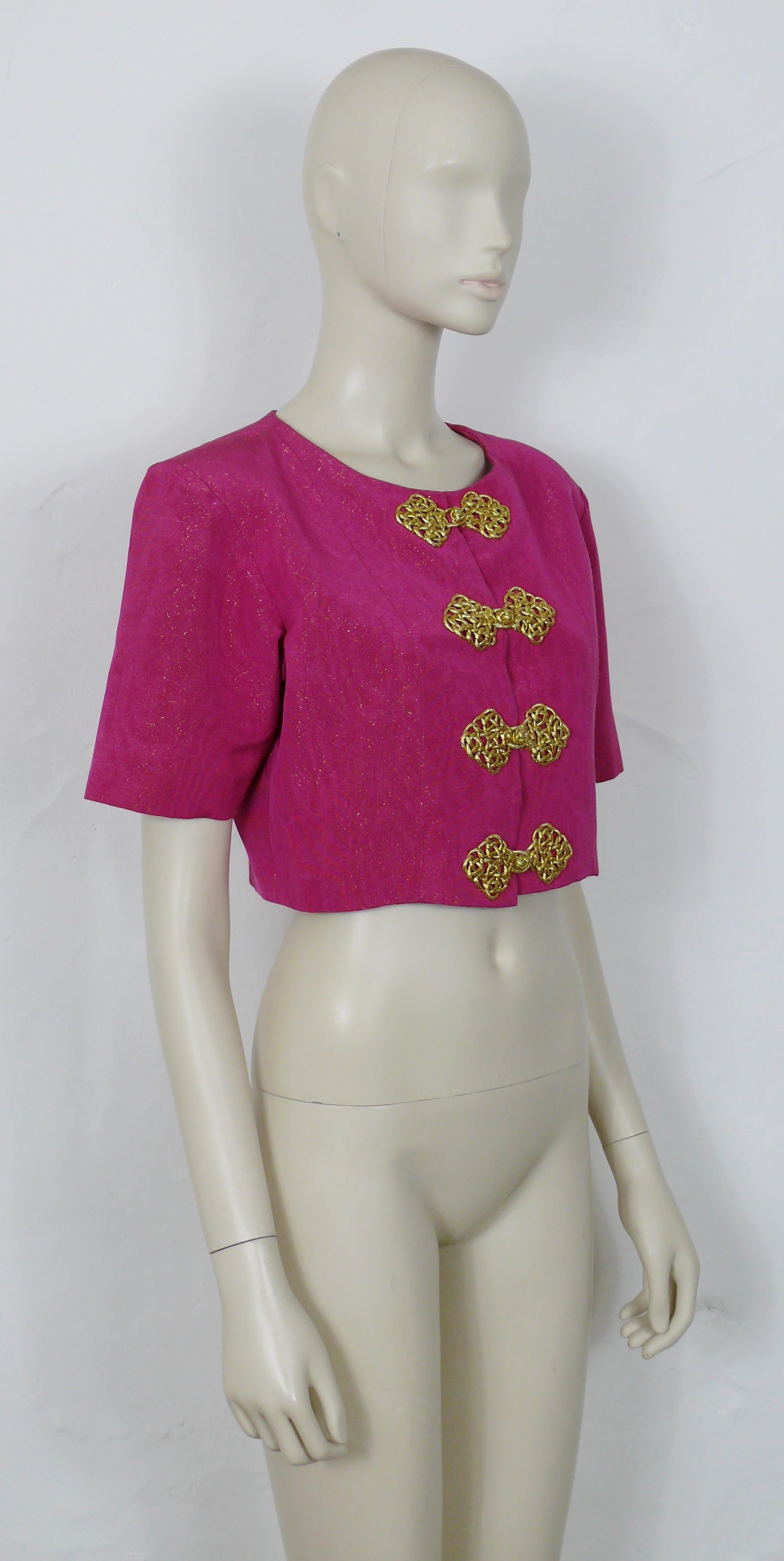 YVES SAINT LAURENT vintage cropped evening supple jacket from the Spring/Summer Ready-to-Wear 1993 Collection.

Similar jacket worn on the runway by NADEGE DUBOSPERTUS.

This JACKET features :
- Cropped length.
- Metal fuschia fabric.
- Elaborated
