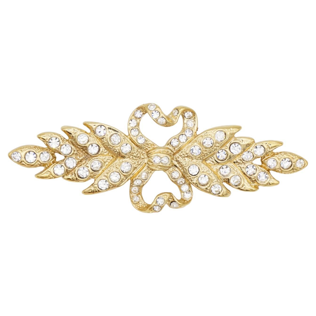 Yves Saint Laurent YSL Vintage Double Heart Love Crown Bow Crystals Leaf Brooch, Gold Tone

Very good condition. Very rare to find. 100% Genuine.

Signed on the back Yves Saint Laurent, Made in France.

Size: 8.8*3.5 cm.

Weight: 23 g.

_ _ _

Great