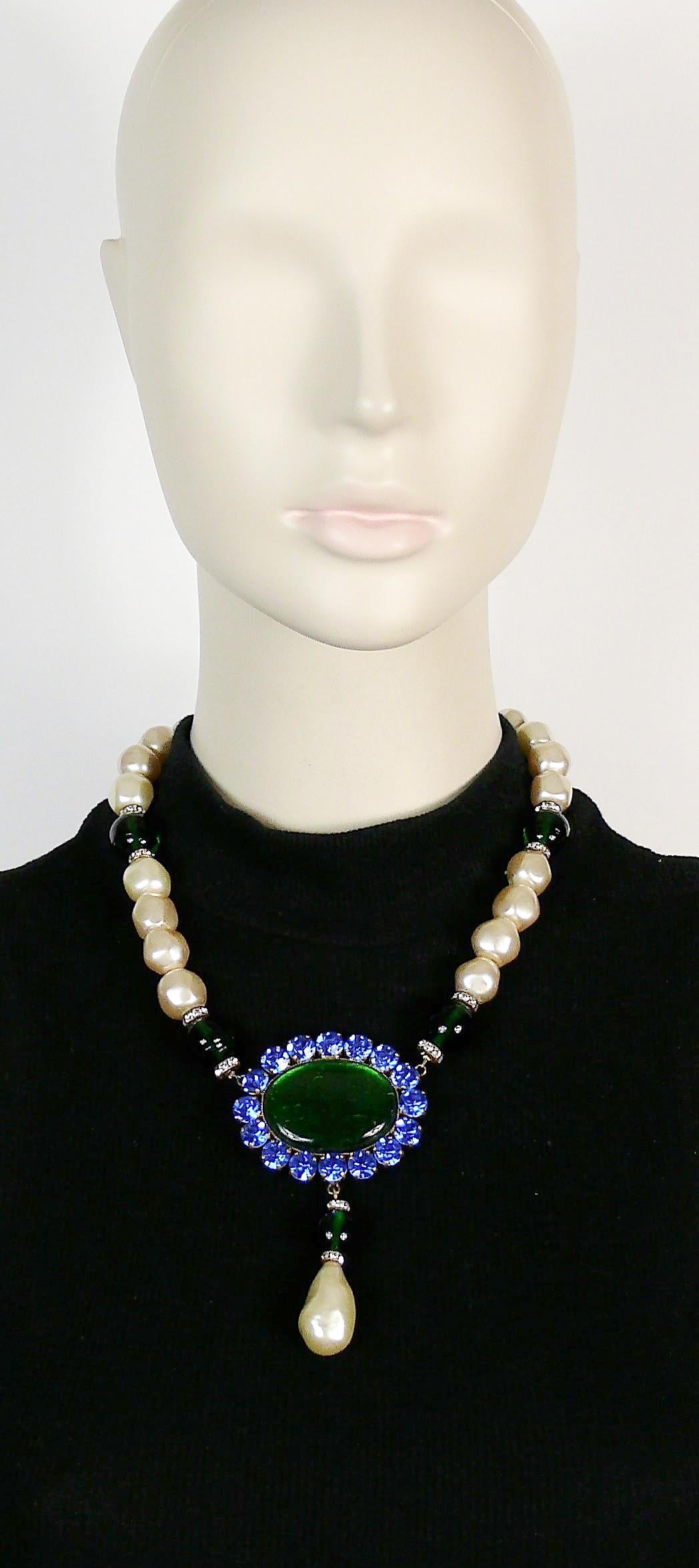 YVES SAINT LAURENT vintage necklace featuring large emerald glass beads/cabochon, faux pearls, emerald/sapphire crystals and clear crystal rondelles.

Hook clasp closure.

Unmarked (missing the YSL signature tag).

Indicative measurements : length