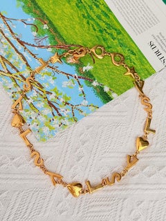 Yves Saint Laurent YSL Vintage Oro Cuore Stella Classic Logo Charms Collana lunga