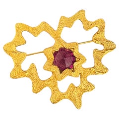 Broche Yves Saint Laurent (YSL) vintage en or, rare, signée Gripoix, en forme de cœur d'améthyste avec motif « Starburst »