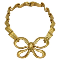 YVES SAINT LAURENT YSL Vintage Gold Tone Bow Ribbon Choker Necklace