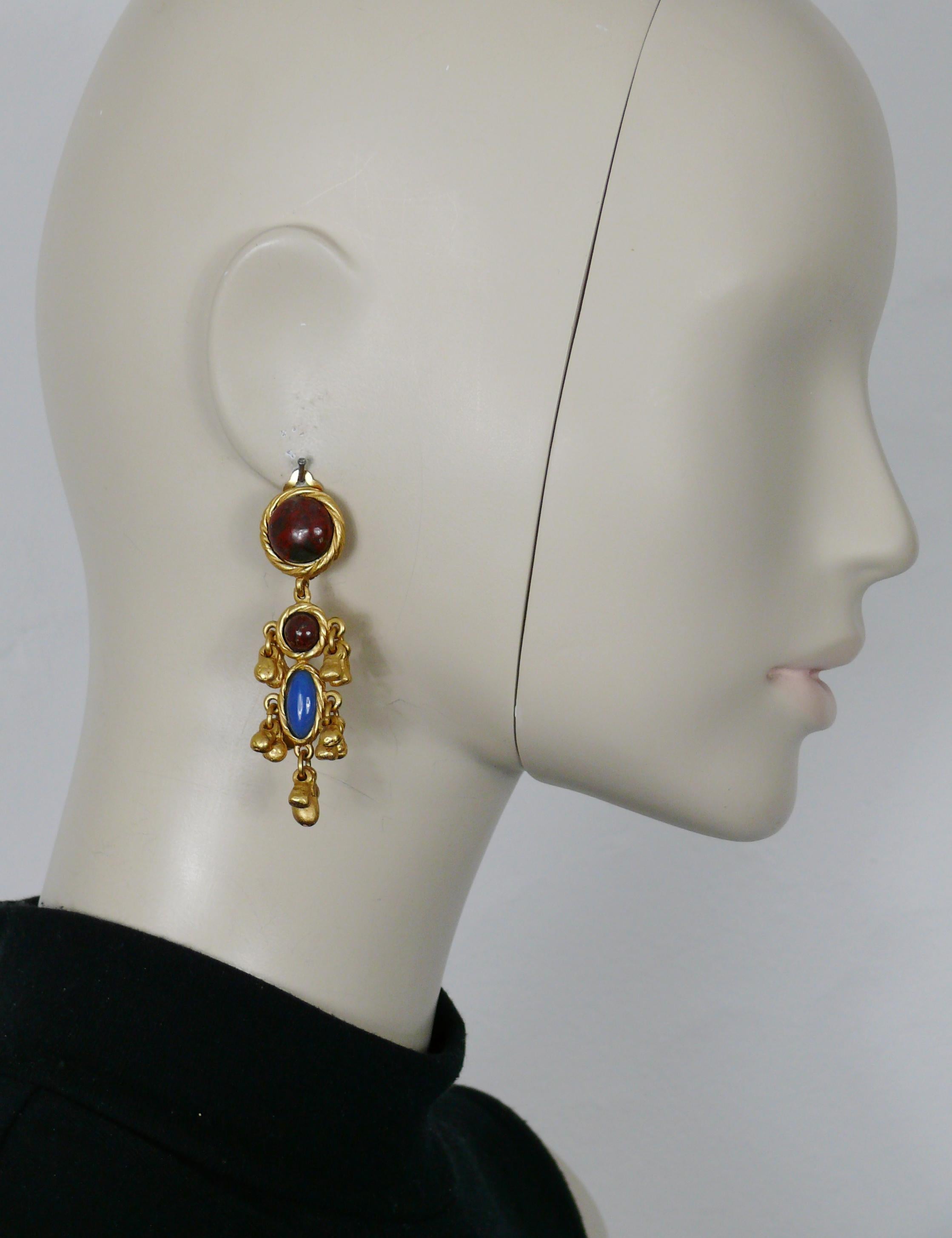 YVES SAINT LAURENT vintage gold tone dangling earrings (clip-on) embellished with faux stones glass cabochons and gilt charms.

Embossed YSL Made in France.

Indicative measurements : max. height approx. 6.9 cm (2.72 inches) / max. diameter approx.