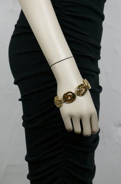 YVES SAINT LAURENT YSL Vintage Gold Tone Fossil Bracelet