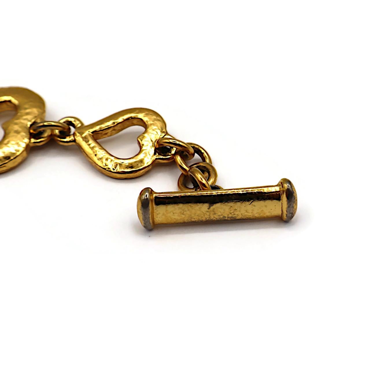 YVES SAINT LAURENT YSL Bracciale d'epoca con cuore in tono dorato in vendita 6