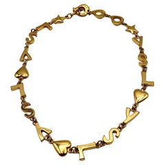 YVES SAINT LAURENT YSL Vintage Gold Tone Iconic Initials Hearts Stars Necklace
