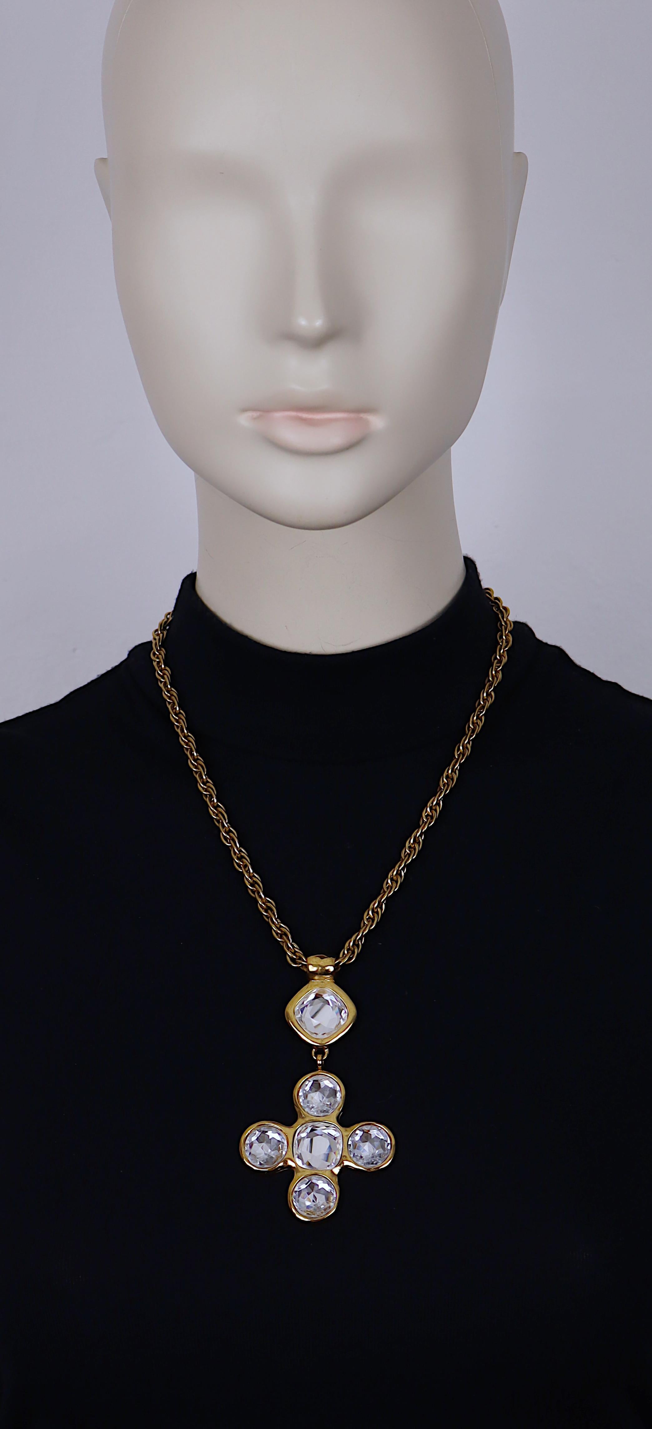 YVES SAINT LAURENT vintage gold tone chain necklace featuring a cross pendant embellished with faceted clear crystals.

Adjustable lobster clasp closure.

Embossed YSL Made in France.

Indicative measurements : adjustable length from approx. 49 cm