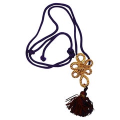 YVES SAINT LAURENT YSL Vintage Gold Tone Knot and Tassel Pendant Necklace