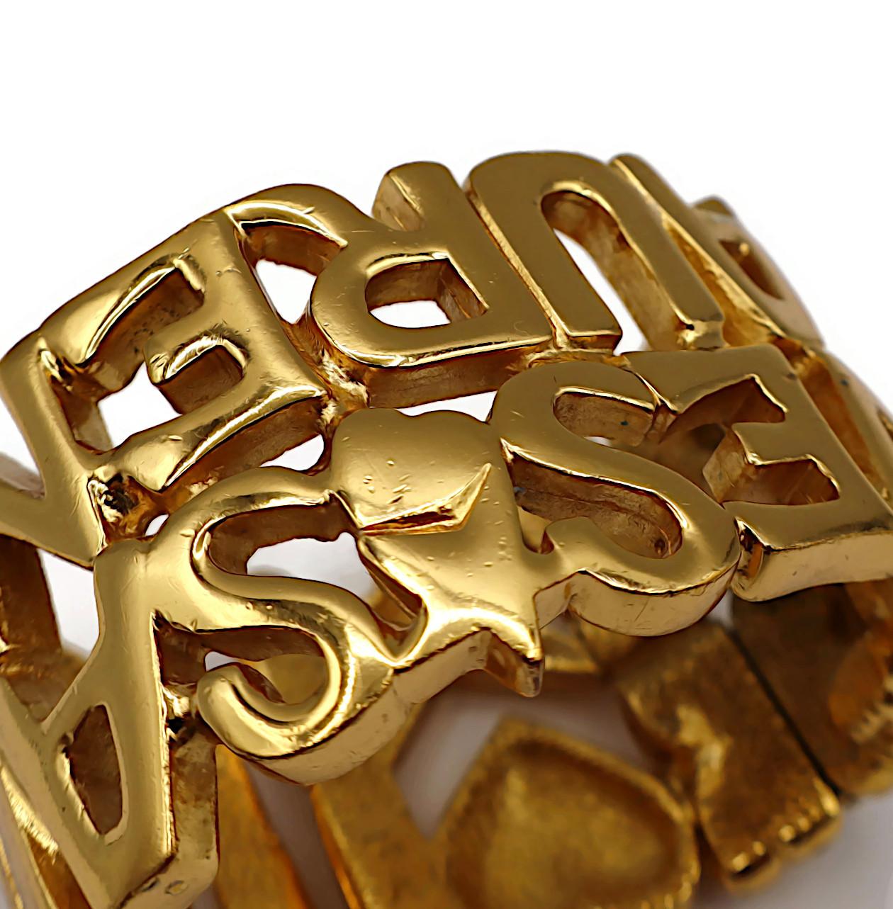 YVES SAINT LAURENT YSL Vintage Gold Tone Letter Heart Star Cuff Bracelet For Sale 13