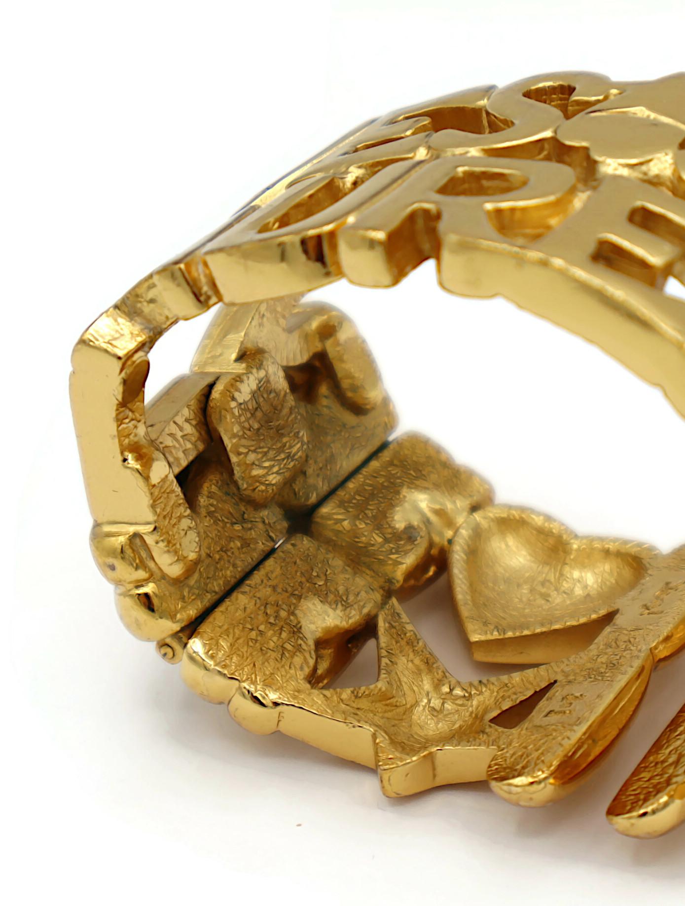 YVES SAINT LAURENT YSL Vintage Gold Tone Letter Heart Star Cuff Bracelet For Sale 16