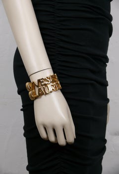YVES SAINT LAURENT YSL Vintage Gold Tone Letter Heart Star Manschettenarmband