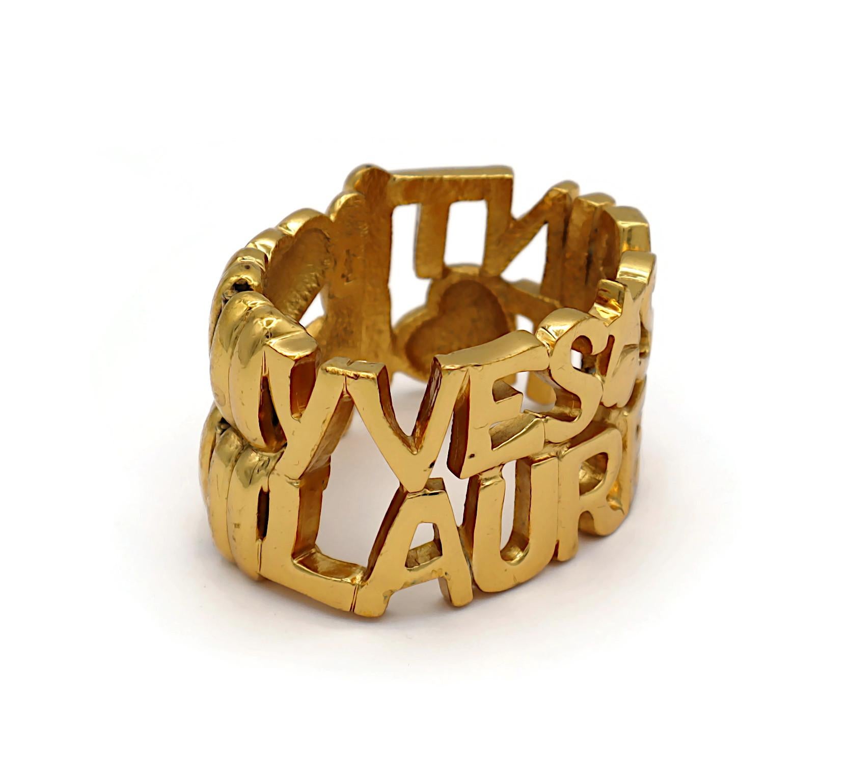YVES SAINT LAURENT YSL Vintage Gold Tone Letter Heart Star Cuff Bracelet In Good Condition For Sale In Nice, FR