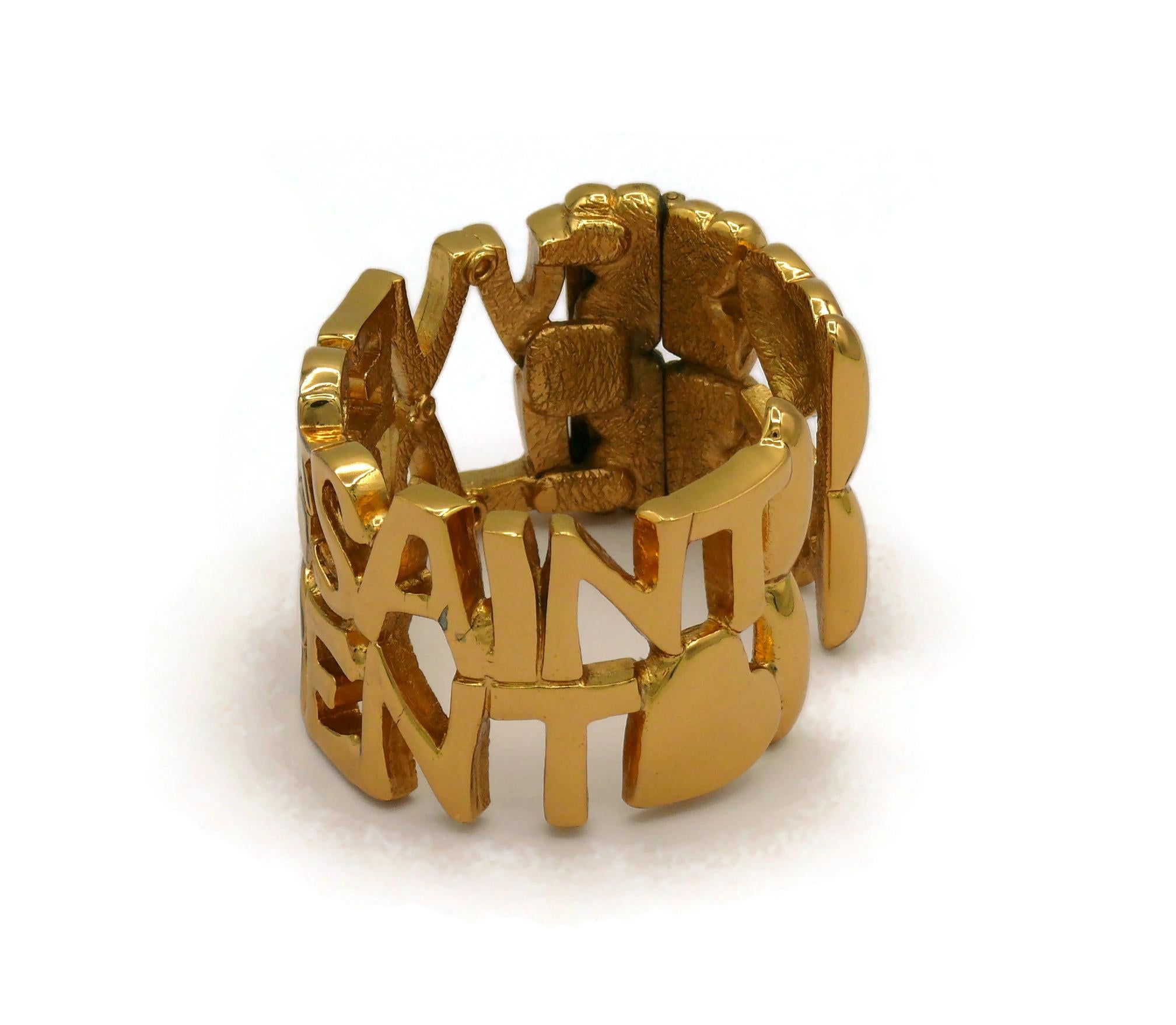 YVES SAINT LAURENT YSL Vintage Gold Tone Letter Heart Star Manschettenarmband im Angebot 1