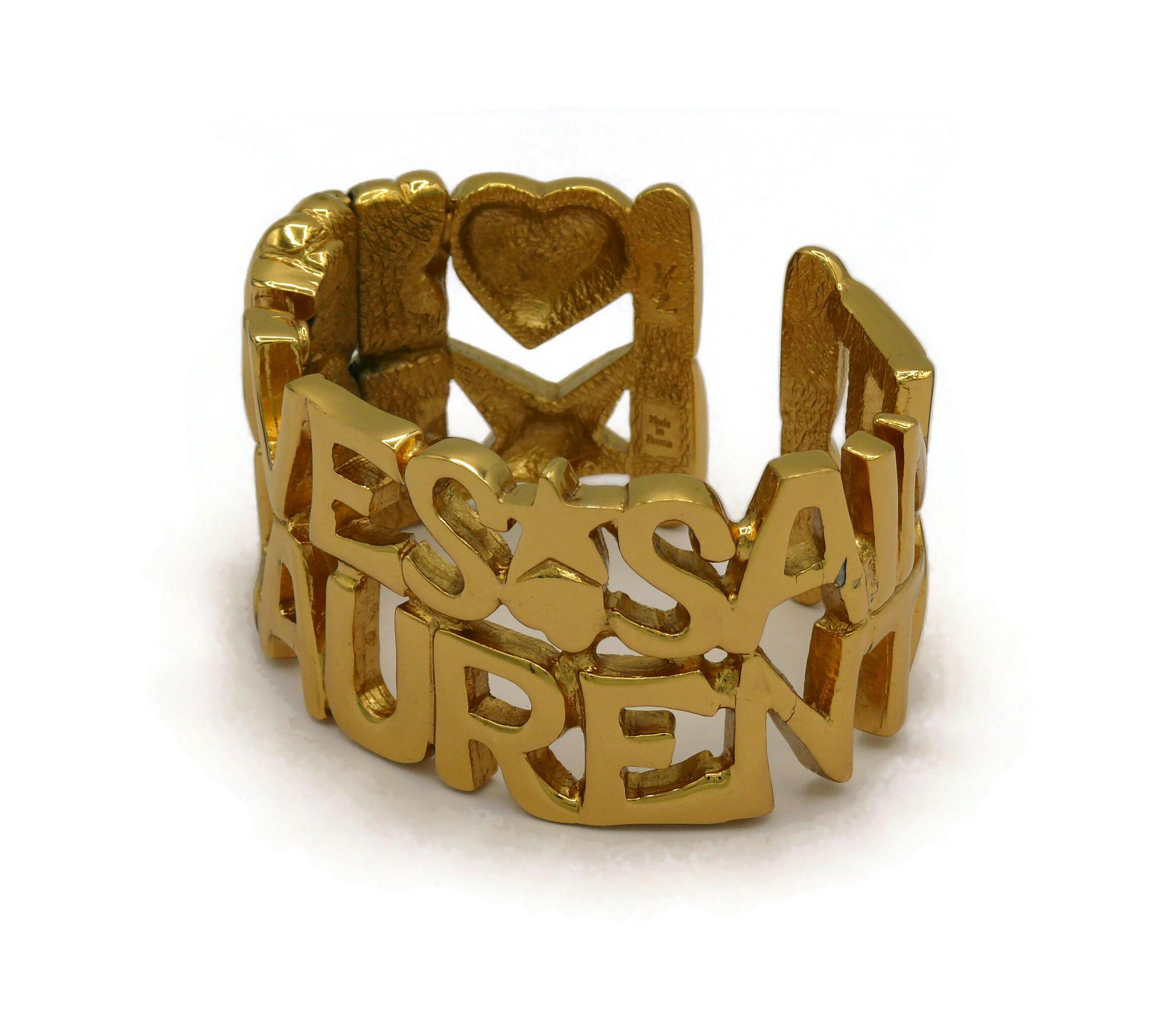 YVES SAINT LAURENT YSL Vintage Gold Tone Letter Heart Star Cuff Bracelet In Fair Condition For Sale In Nice, FR