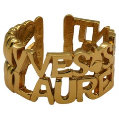 YVES SAINT LAURENT YSL Vintage Gold Tone Letter Heart Star Cuff Bracelet