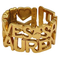 YVES SAINT LAURENT YSL Pulsera brazalete estrella corazón letras vintage tono oro