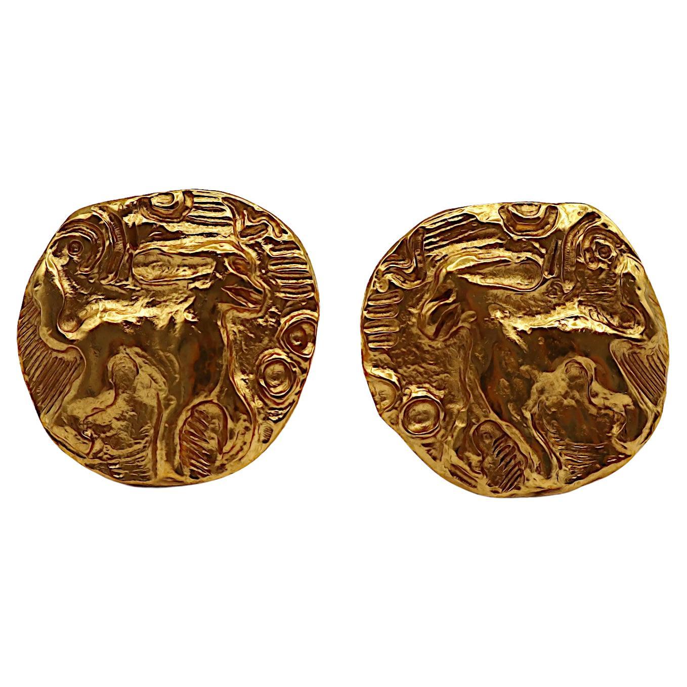 YVES SAINT LAURENT YSL Pendientes de clip criatura mitológica vintage tono dorado en venta