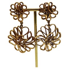 YVES SAINT LAURENT YSL Vintage Orecchini a filo con fiori traforati in tonalità oro