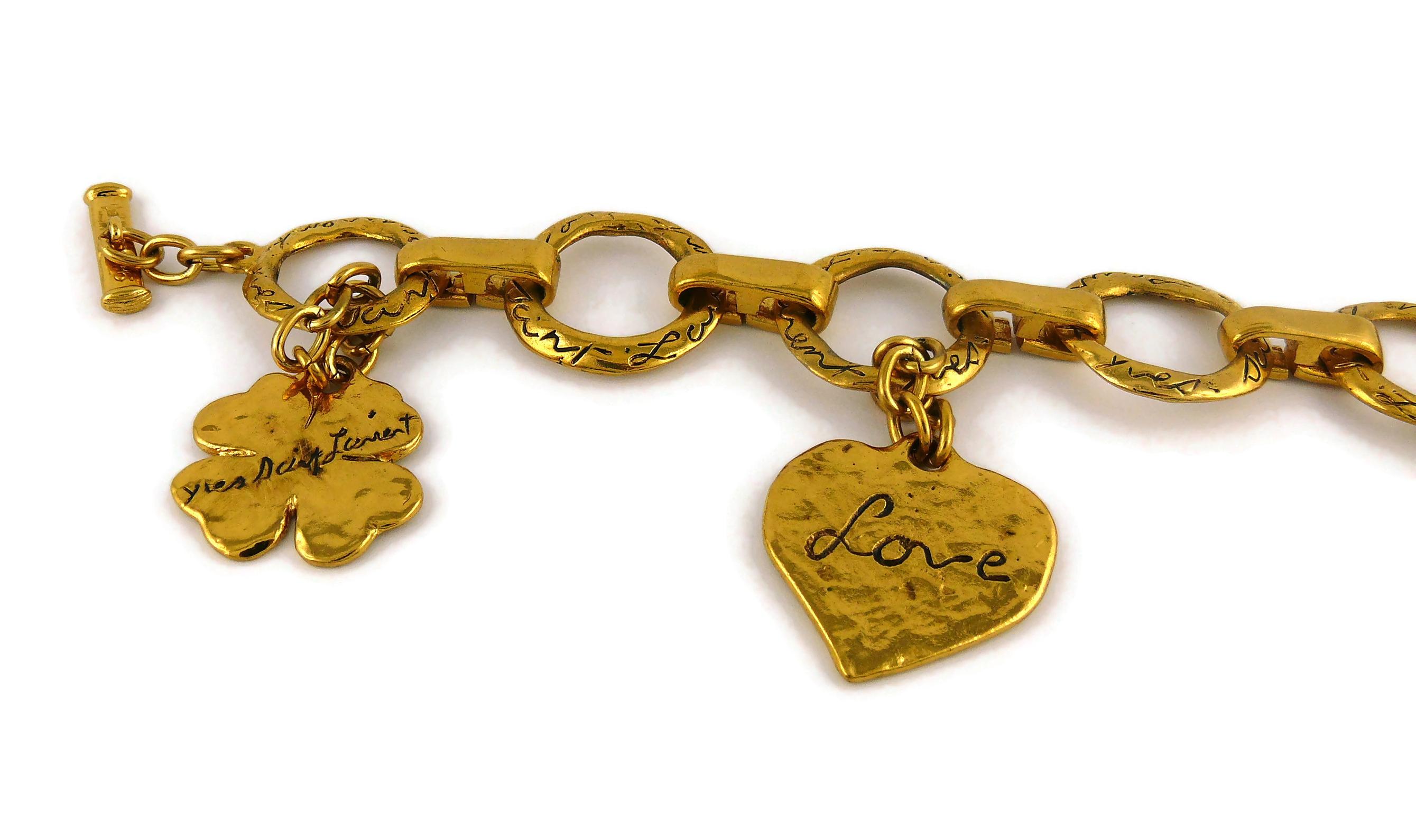 Yves Saint Laurent YSL Vintage Gold Toned Charm Bracelet In Excellent Condition In Nice, FR