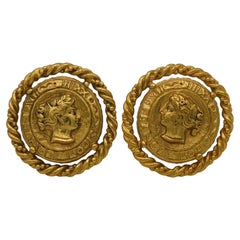 Clips d'oreilles vintage Yves Saint Laurent YSL profil de femme en or
