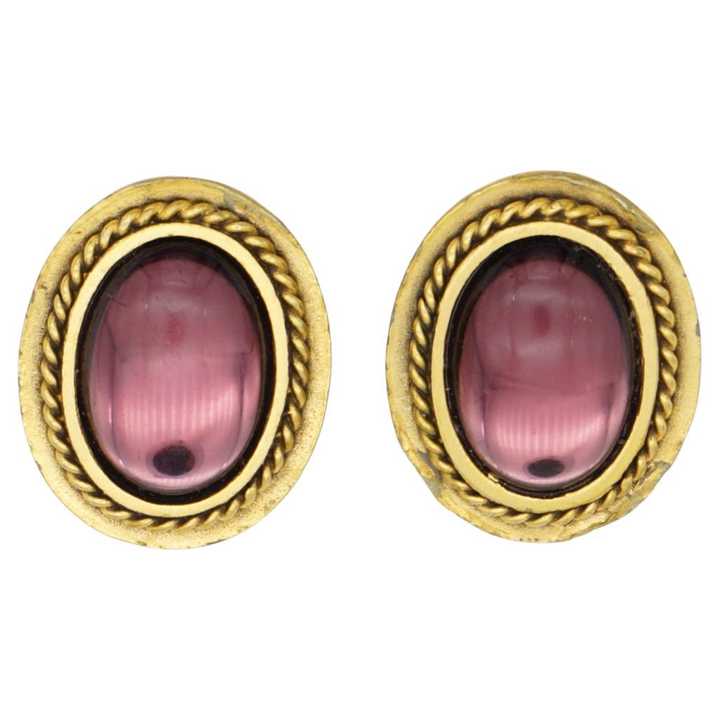 Yves Saint Laurent YSL Vintage Arty Unisex Gripoix Amethyst Purple Oval Cabochon Rope Clip Earrings, Gold Tone

Very good condition. Some light scratches and colour loss at side. But still every good to use. 100% Genuine. 

Vintage and very rare to