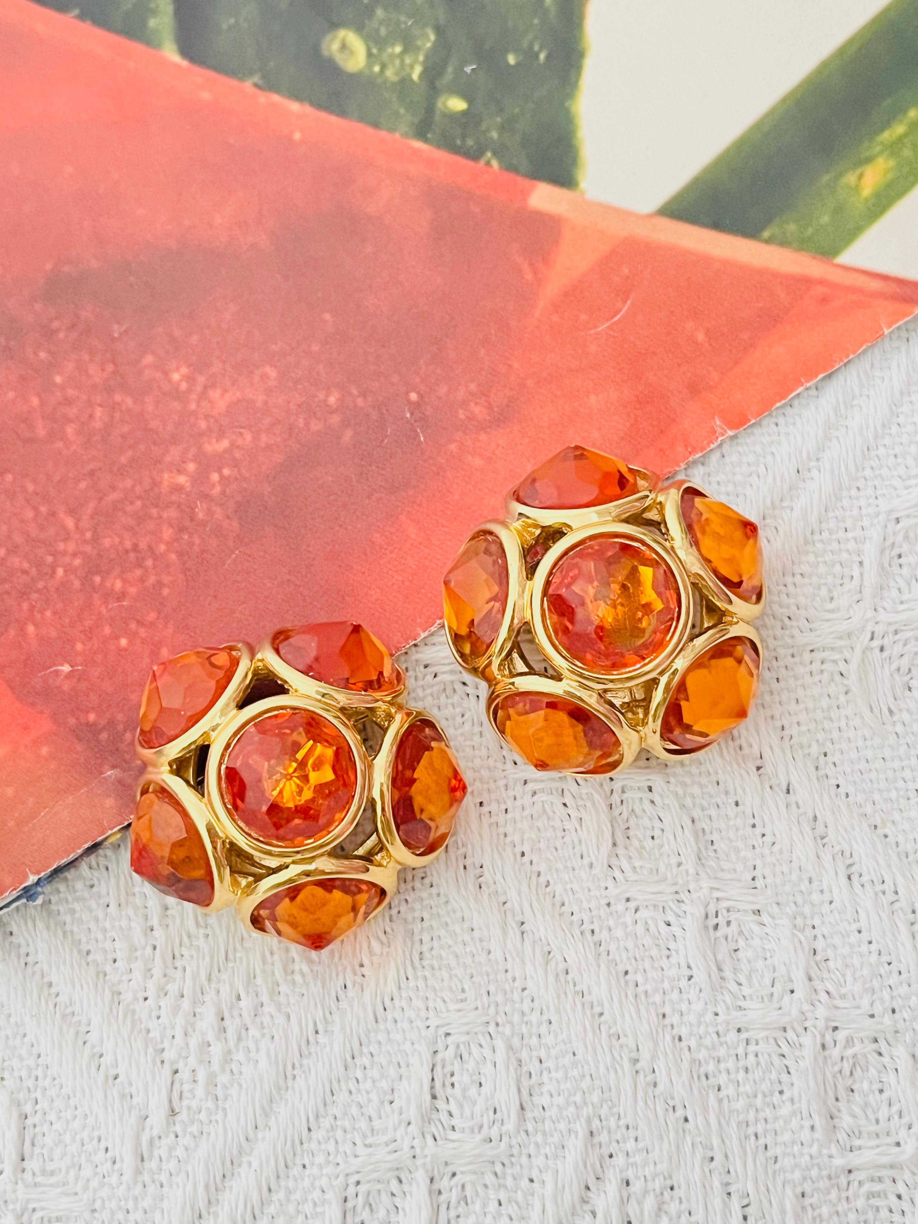 Yves Saint Laurent YSL Vintage Gripoix Citrine Orange Cabochon Six Crystals Pentagram Flower Dome Openwork Chunky Statement Elegant Clip Earrings, Gold Tone

Very good condition. Maybe light scratches or colour loss, barely noticeable. 100% Genuine.