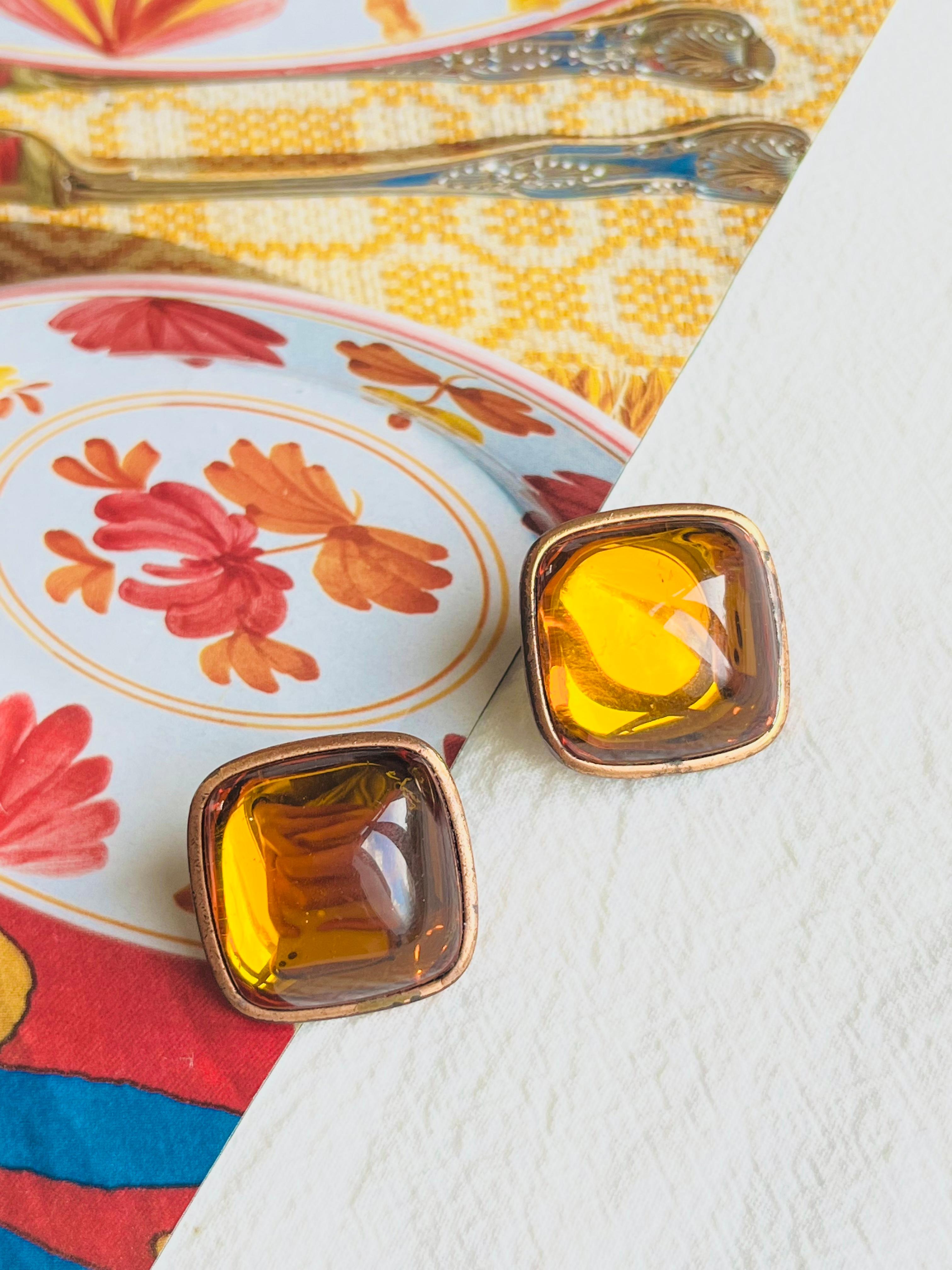 Yves Saint Laurent YSL Vintage Gripoix Large Orange Amber Yellow Cabochon Crystal Square Candy Jelly Belly Chunky Statement Elegant Clip Earrings, Gold Tone

Good condition. Some light scratches at side and back, colour loss at back. But still every