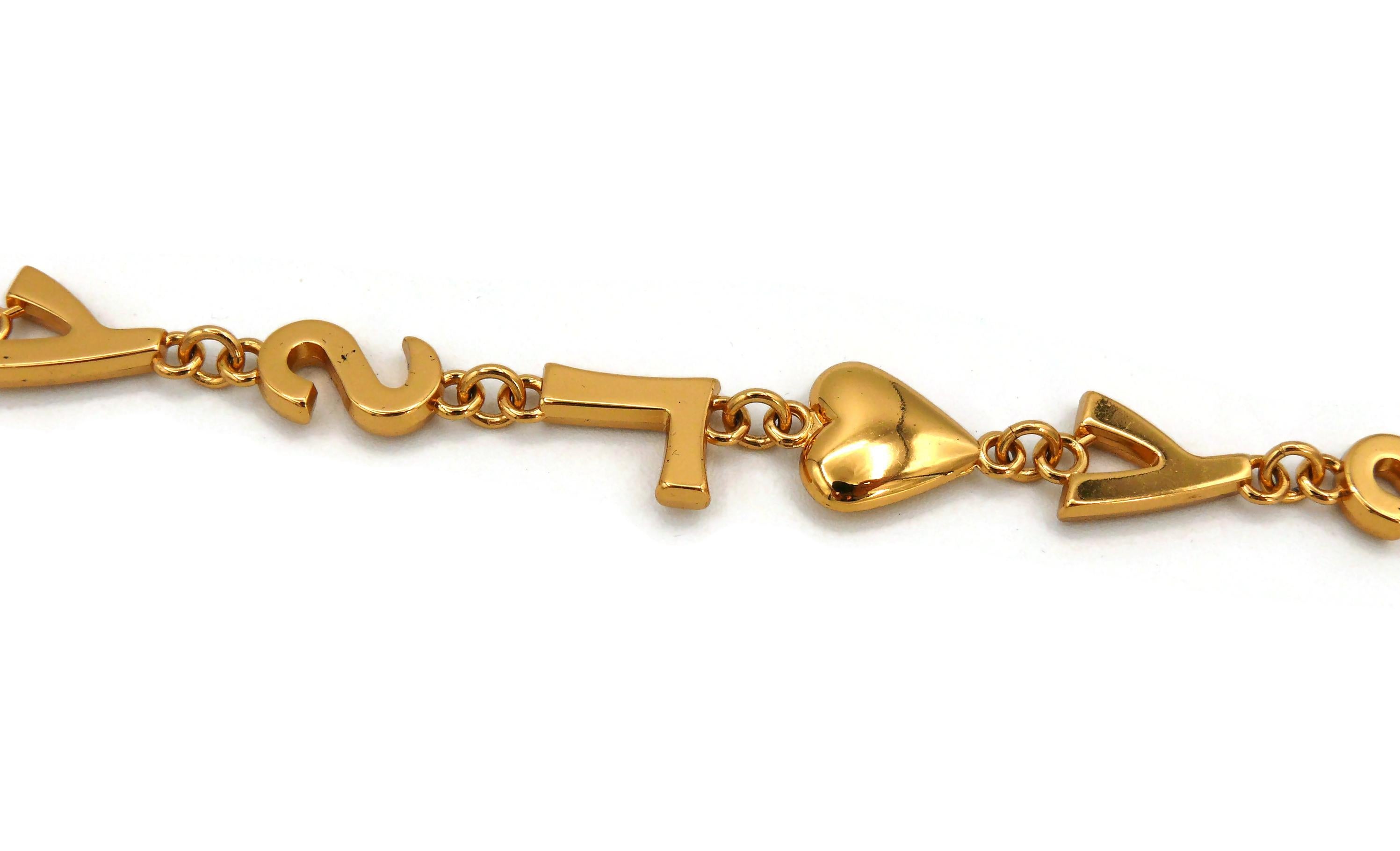 YVES SAINT LAURENT Collier vintage emblématique cœurs d'étoiles Pour femmes en vente