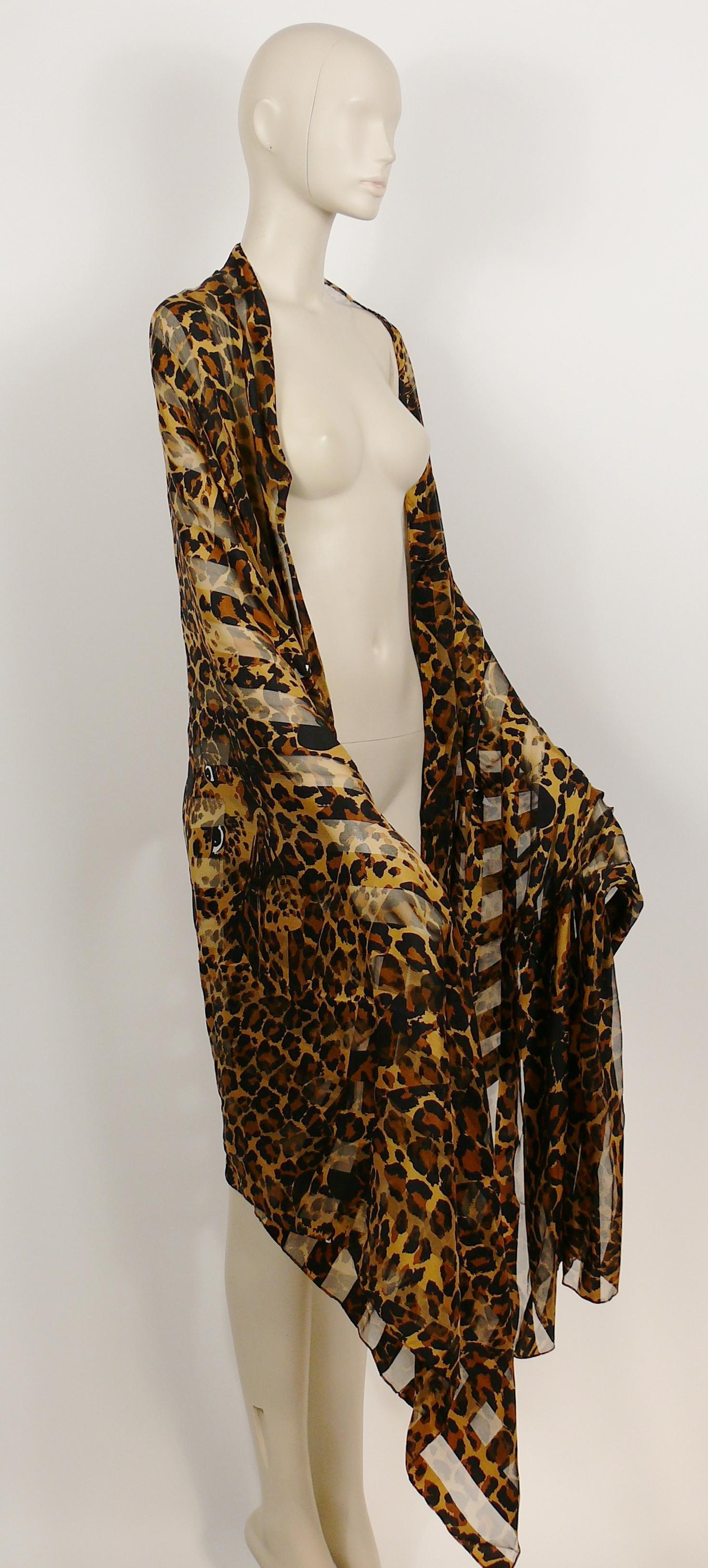 YVES SAINT LAURENT vintage iconic stole featuring an iconic opulent leopard striped sheer print.

Could be worn so many different ways !

Embroidered YSL.
Label reads YVES SAINT LAURENT Foulards Made in France.

Composition label reads : 100%