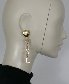 Boucles d'oreilles pendantes vintage YVES SAINT LAURENT YSL