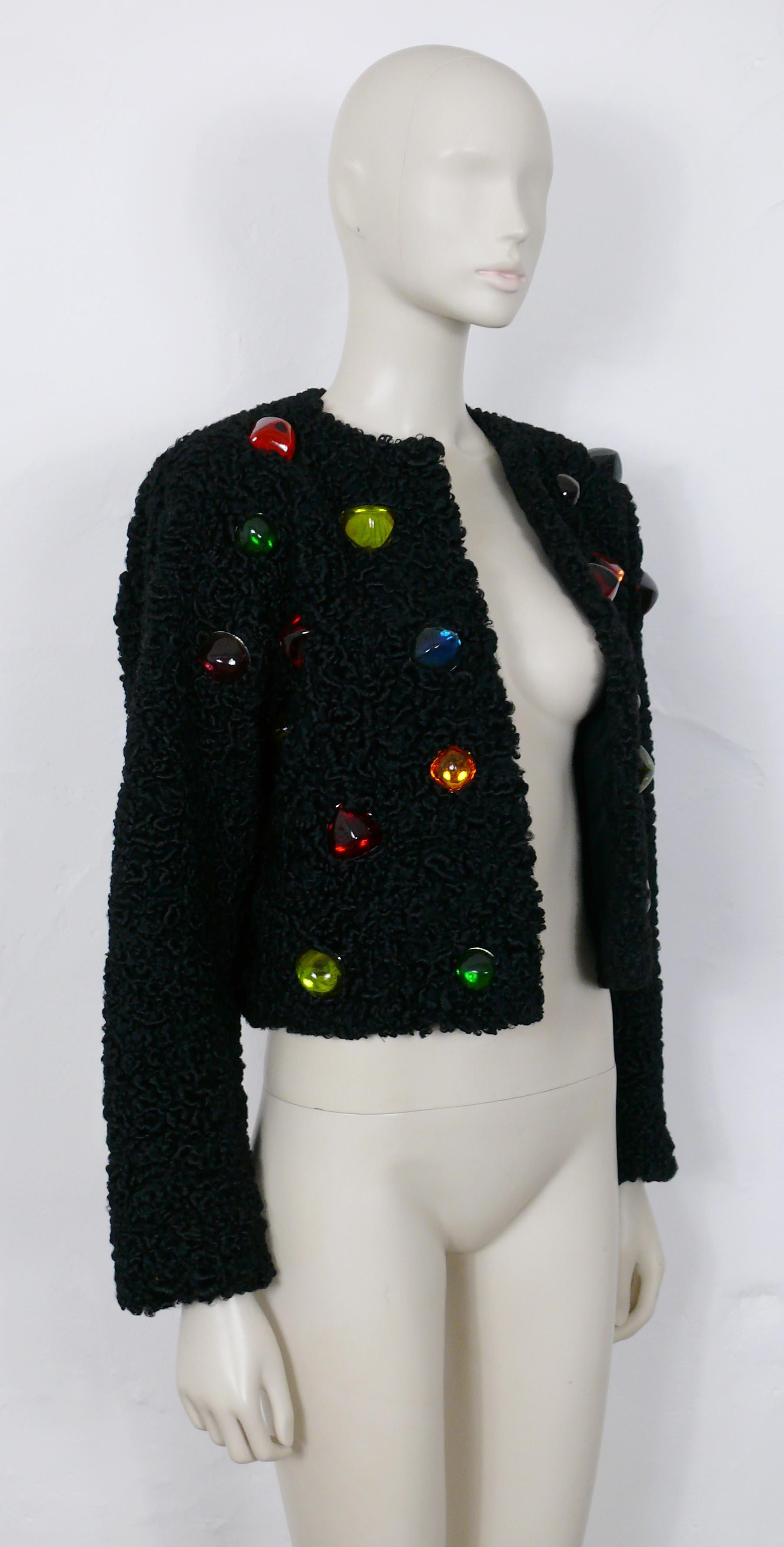 YVES SAINT LAURENT Fourrures vintage rare black astrakhan fur bolero jacket embellished with massive multicolored three-dimensional resin cabochons.

Probably circa 1990.
The pink leather jacket featuring similar resin cabochons on the picture #5 is