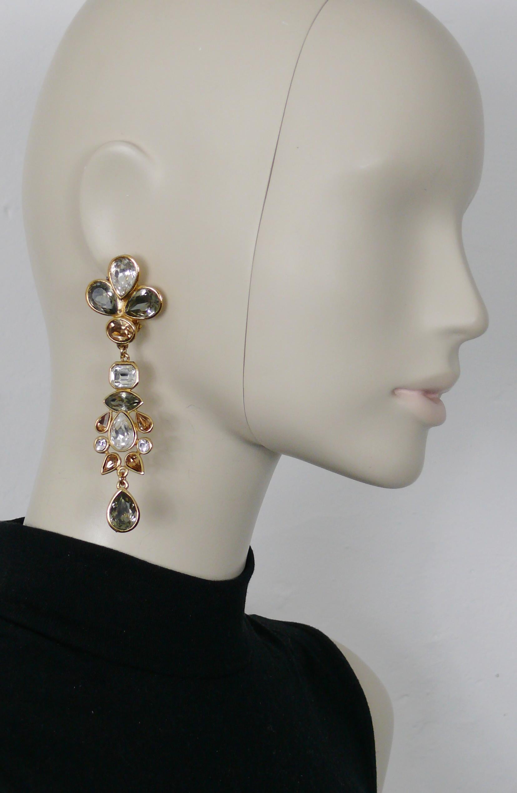 YVES SAINT LAURENT vintage gold toned dangling earrings (clip on) embellished with multicolor crystals.

Embossed YSL Made in France.

Indicative measurements : height approx. 10 cm (3.94 inches) / max. width approx. 3 cm (1.18 inches).

Weight per