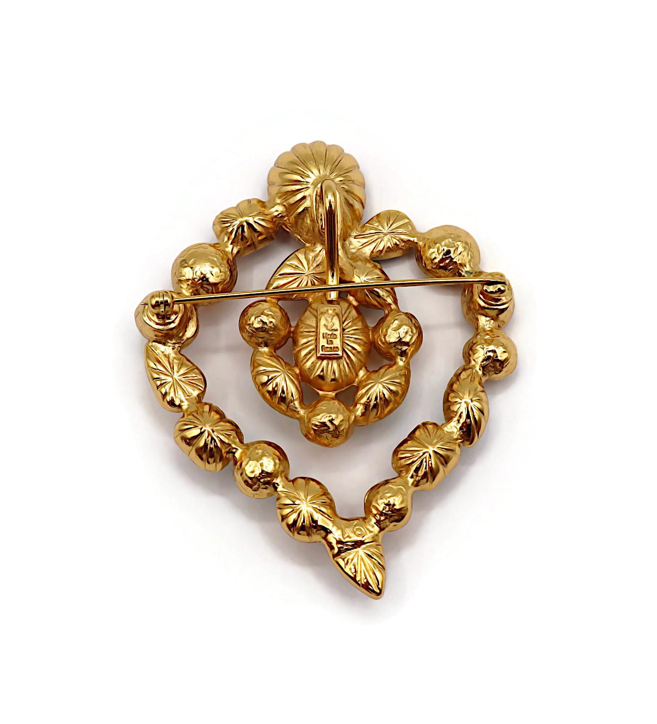 YVES SAINT LAURENT Pendentif broche cœur vintage orné de bijoux YSL en vente 5