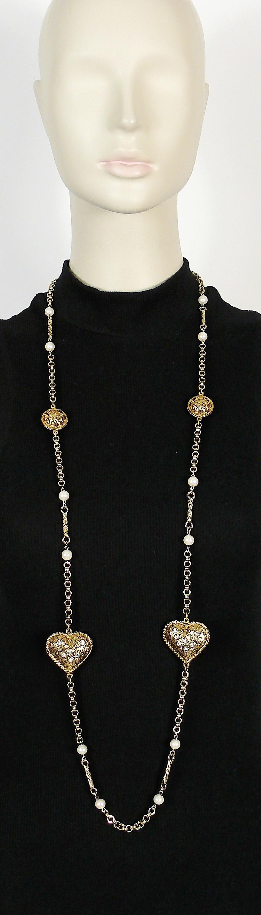YVES SAINT LAURENT RIVE GAUCHE vintage gold toned chain sautoir necklace featuring two jewelled textured hearts, medallions and faux pearls.

This necklace can be wrapped two times around the neck.

Spring clasp closure.

Embossed YVES SAINT LAURENT