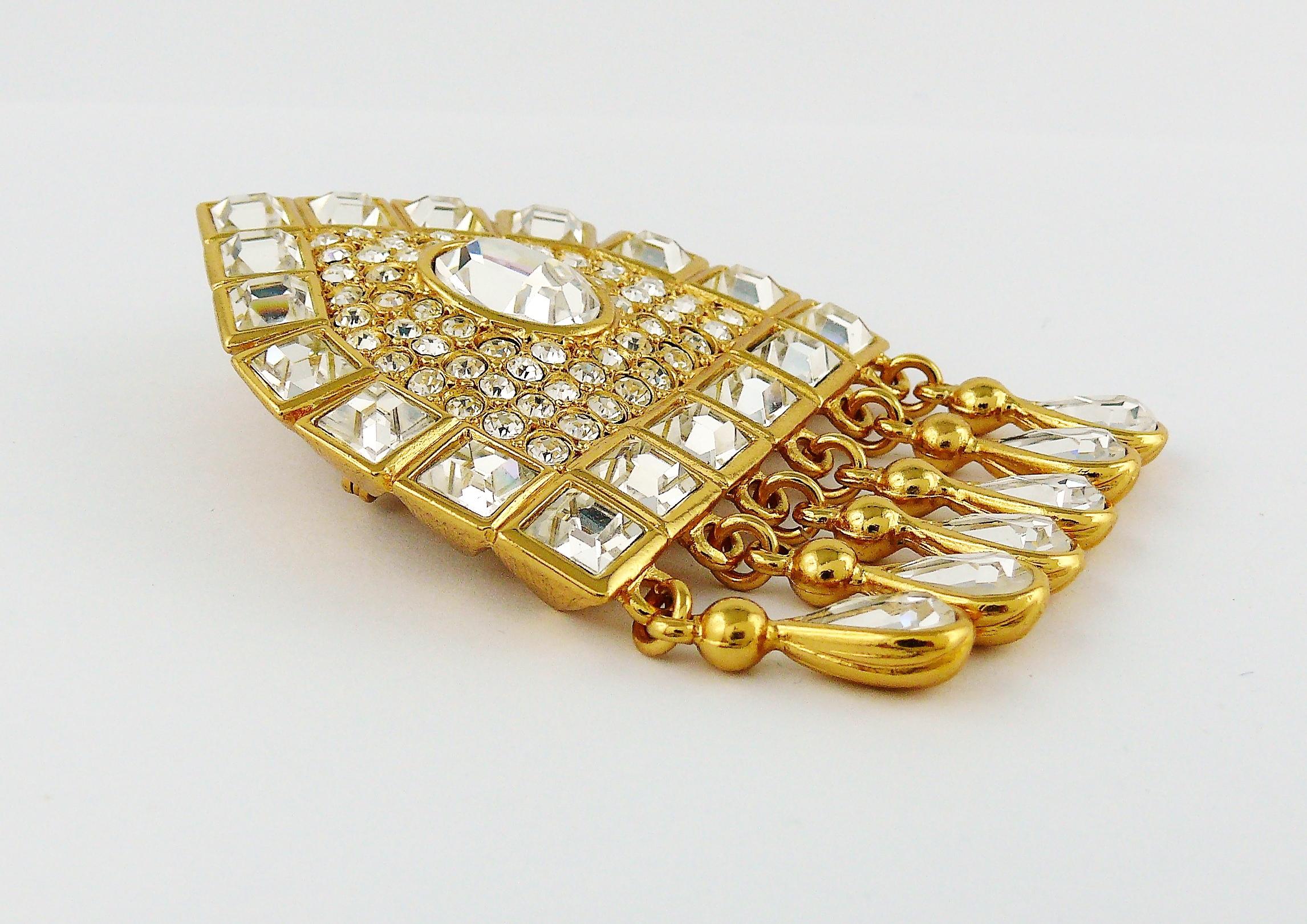 YVES SAINT LAURENT vintage gold toned massive an opulent brooch/pendant featuring a RUSSIAN inspired design with clear crystal embellishement.

Embossed YSL Made in France.

Indicative measurements : length approx. 7.7 cm (3.03 inches) / width