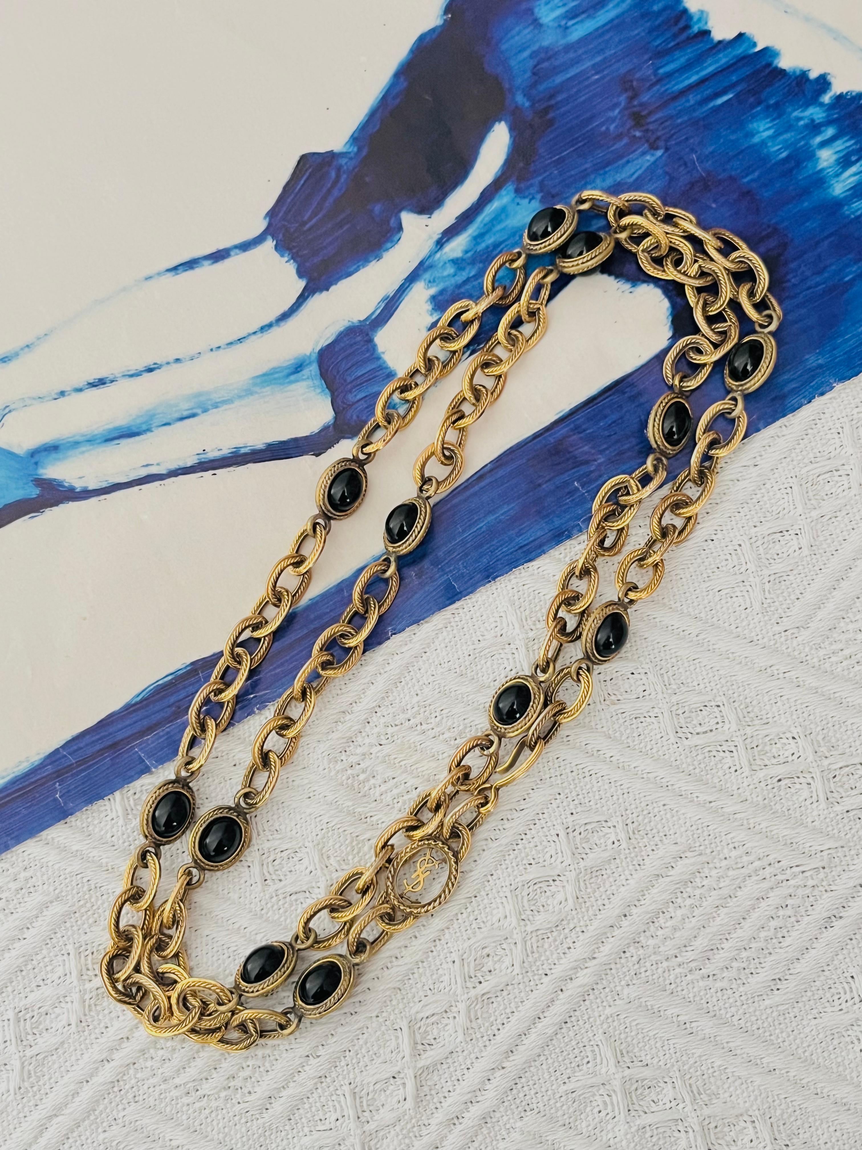 Yves Saint Laurent YSL Vintage Unisex Lungo Cabochon Ovale Onice Pietre Nere Ciondolo Ciondolo Traforato Collegato Collana Chunky Cintura, Placcato Oro

Ottime condizioni. Alcuni leggeri graffi o perdite di colore, appena percettibili. 100%