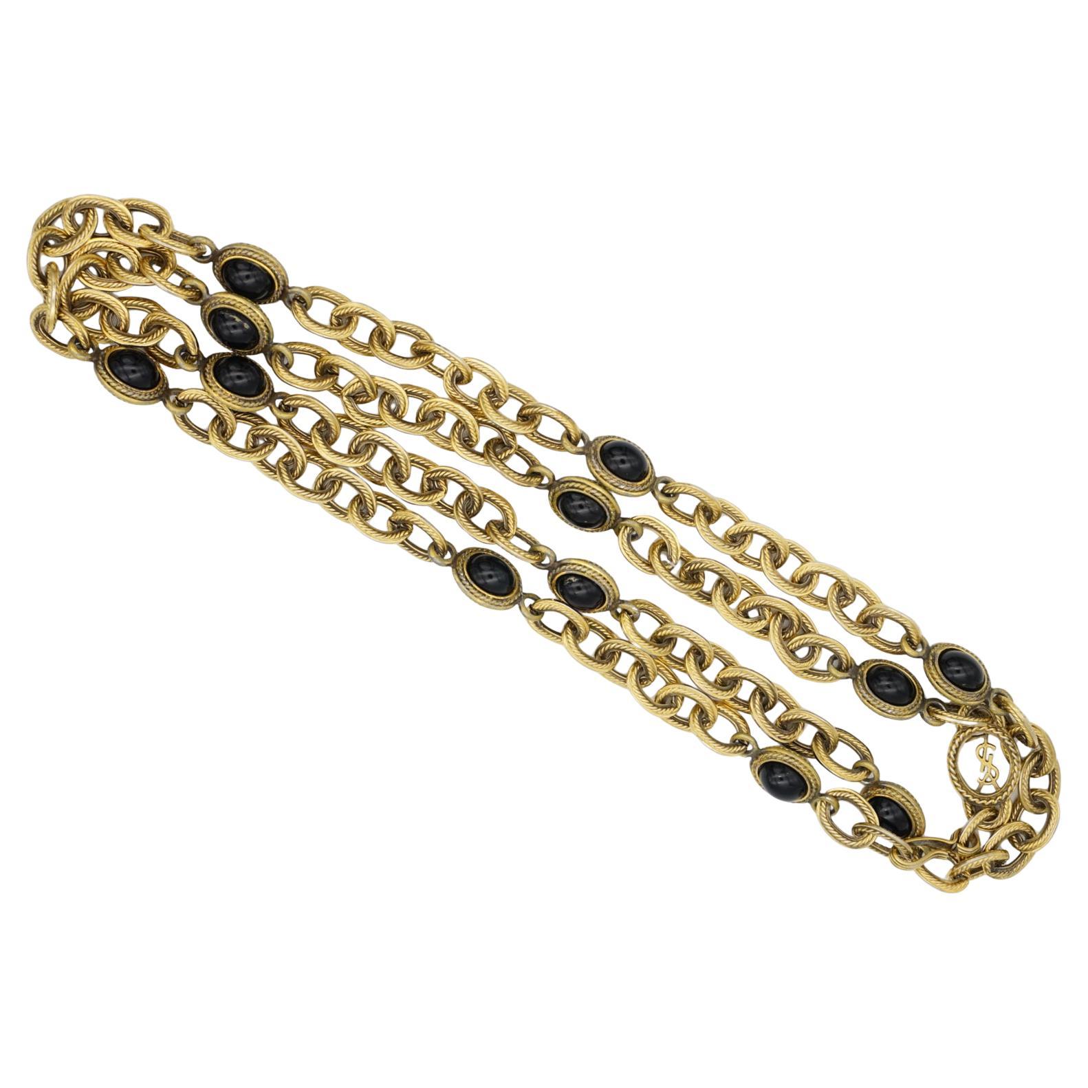 Yves Saint Laurent YSL Vintage Unisex Long Cabochon Oval Onyx Black Stones Charm Pendant Interlocked Openwork Linked Chunky Necklace Belt, Gold Plated

Very good condition. Some light scratches or colour loss, barely noticeable. 100% Genuine.

A