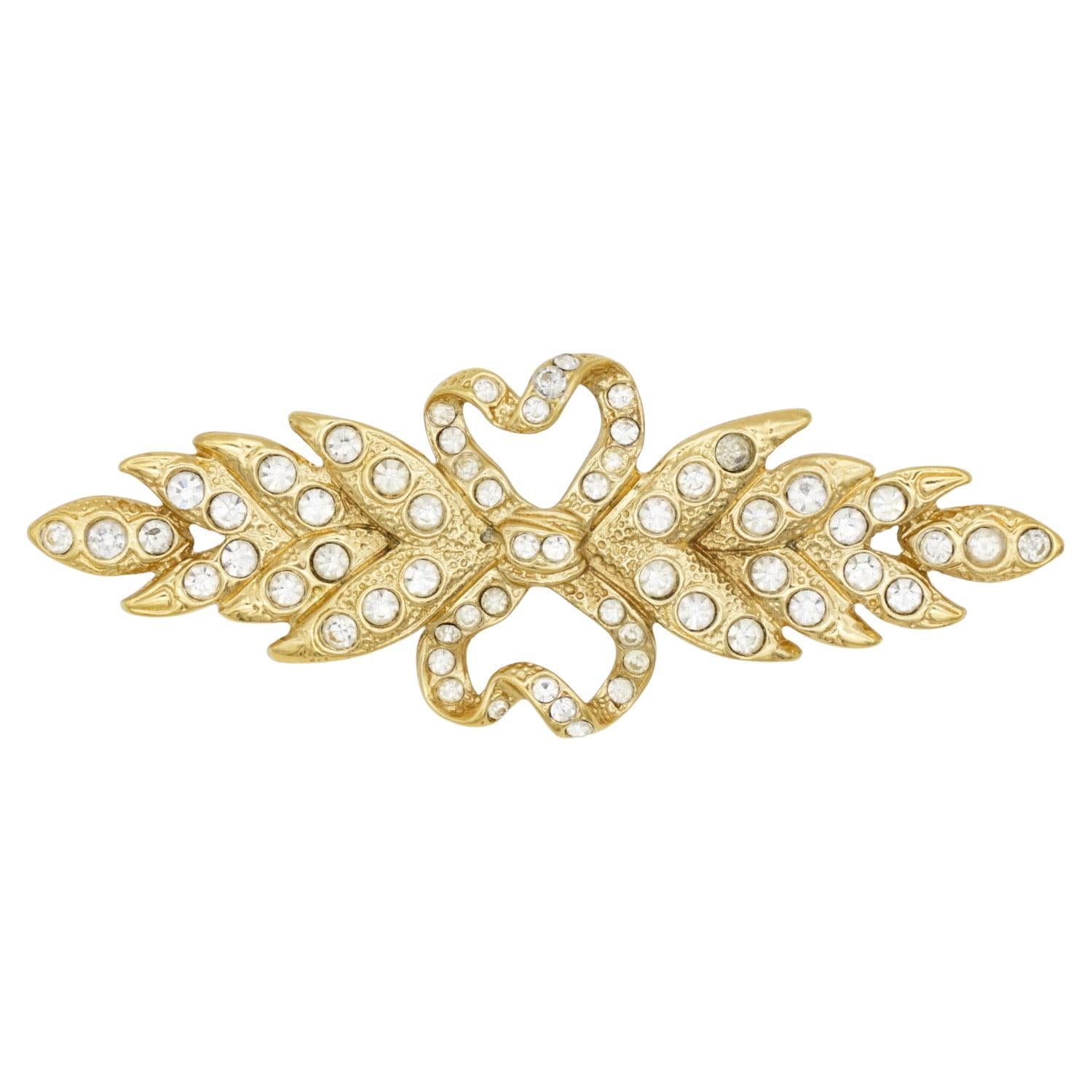 Yves Saint Laurent YSL Vintage Long Leaf Feather Bow Heart Crystals Brooch, Gold Tone

Very good condition. Very rare. 100% Genuine.

Signed on the back Yves Saint Laurent, Made in France.

Size: 8.8*3.5 cm.

Weight: 23 g.

_ _ _

Great for everyday